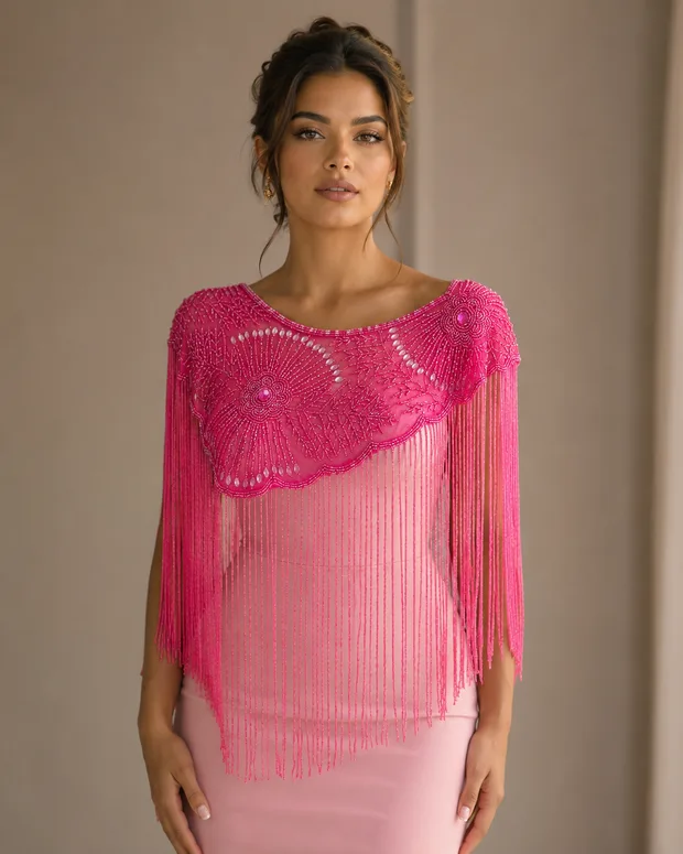 The Fuchsia Solstice — vivid fuchsia beaded caplet with sunburst medallion motif and long bead fringe, luxury occasionwear Canada